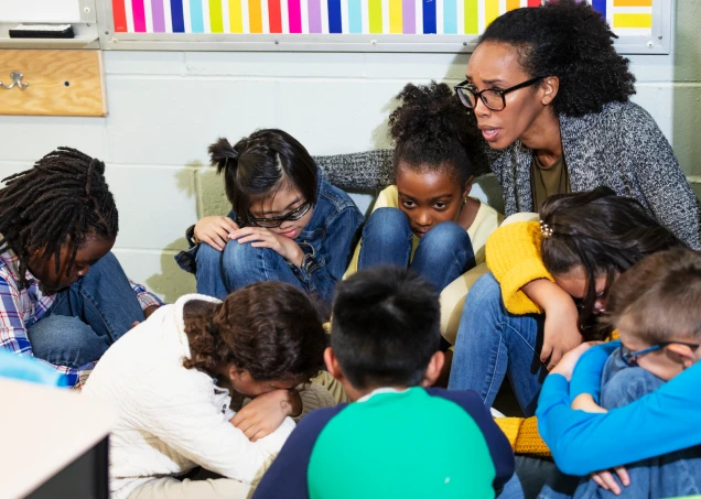 Teacher protecting kids